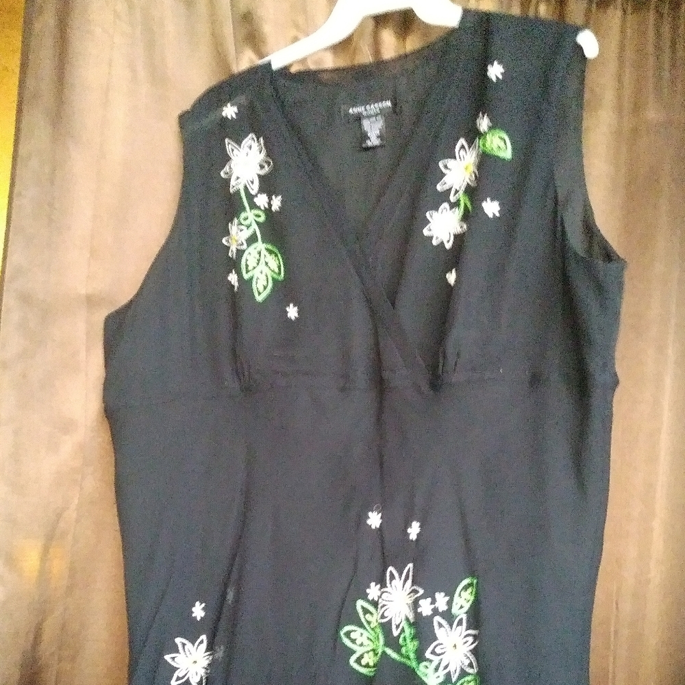 Black Chiffon Womens blouse w/flower accents.